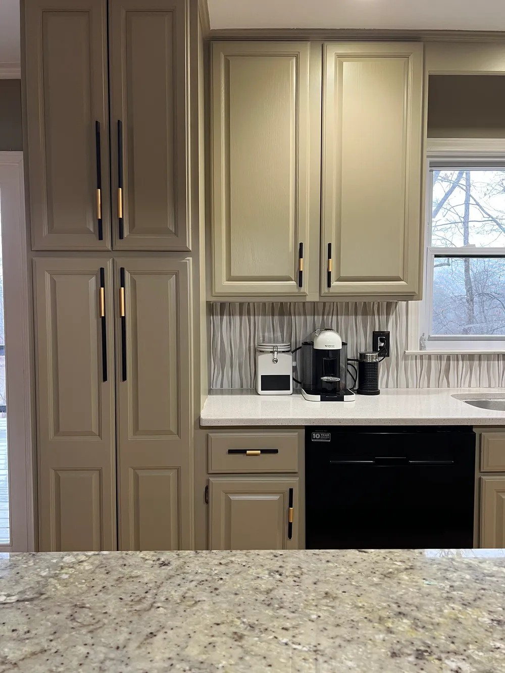 Greige cabinet refinishing with new hardware