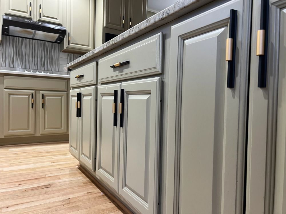 Detail of freshly painted gray cabinetry